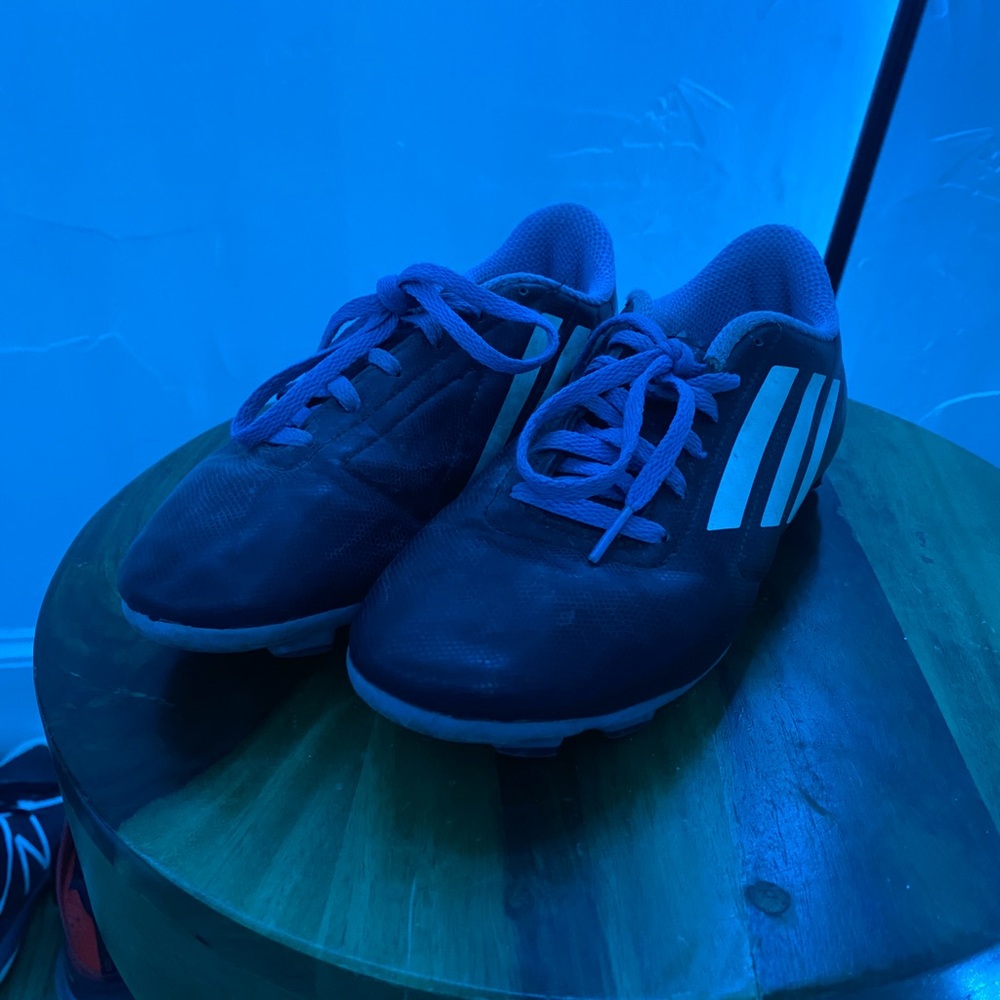 adidas Kids Black and blue soccer cleats, size 5.5